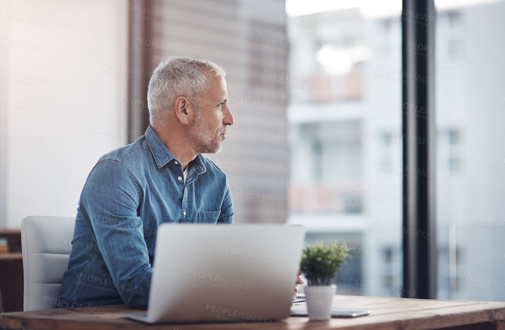 Buy stock photo Mature businessman, company and thinking with laptop for research information, update and business plan. Office, financial advisor and idea with tech for investment, budget report or brainstorming