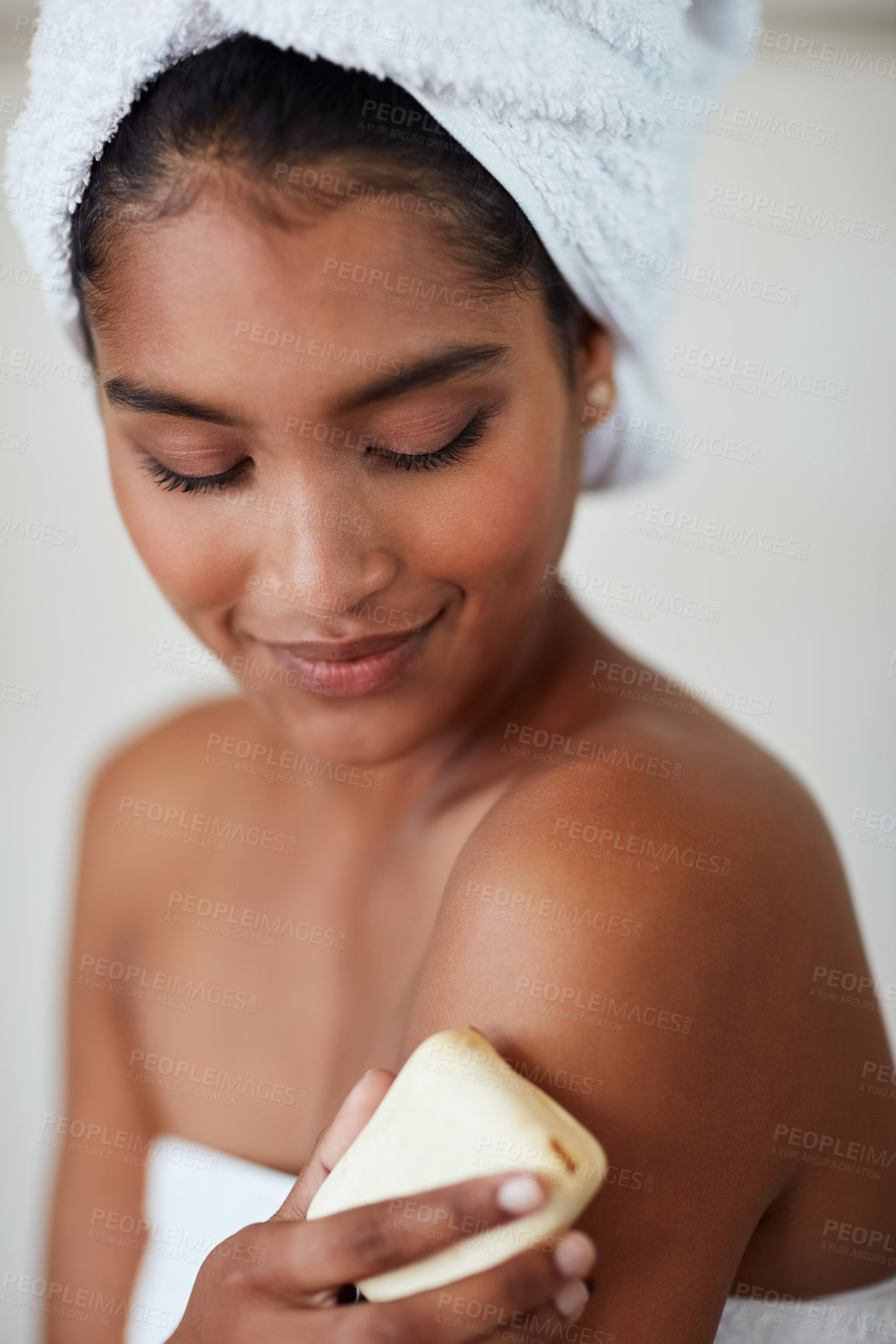 Buy stock photo Shot of an attractive young woman having a relaxing pampering session at home