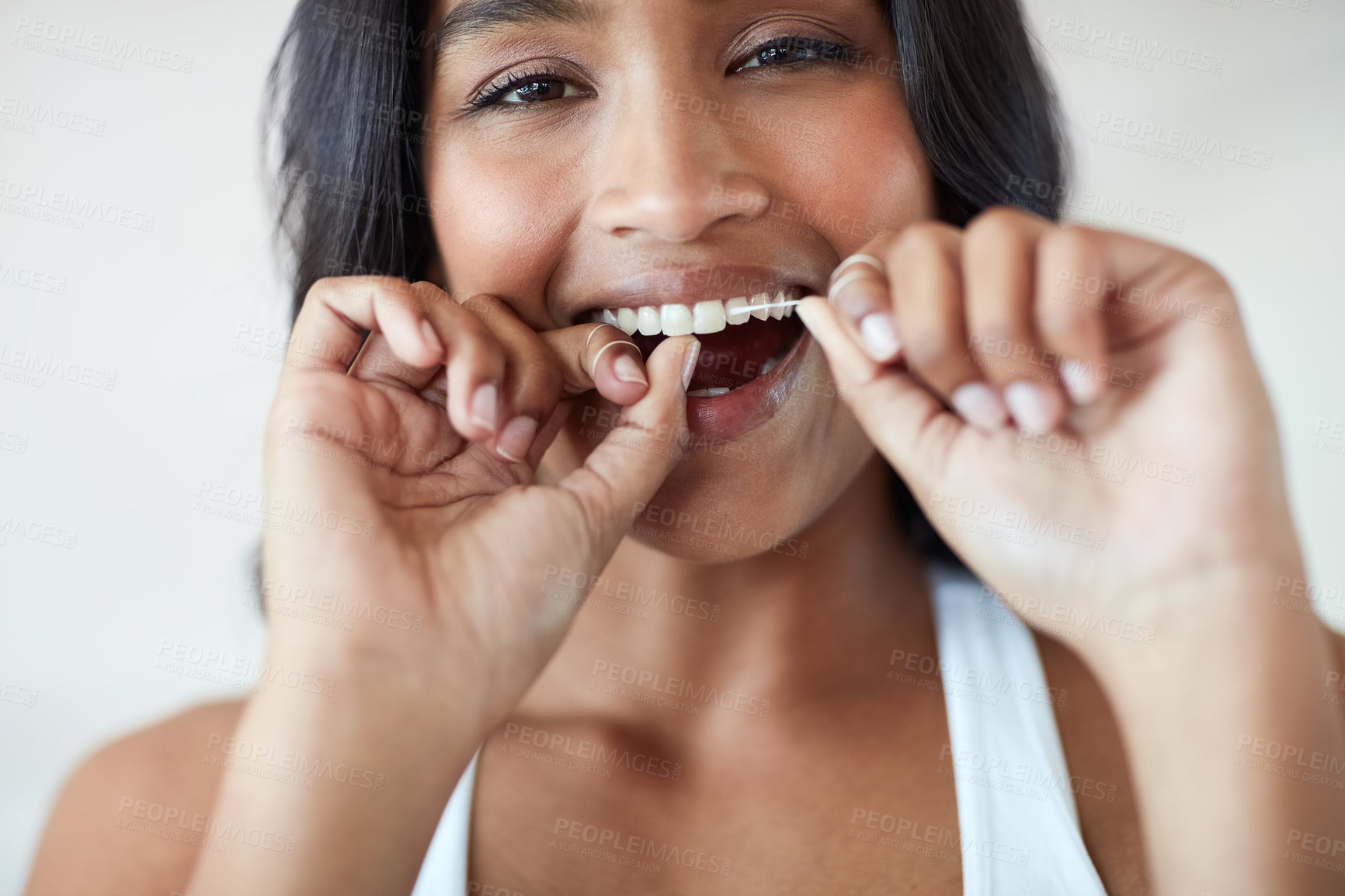 Buy stock photo Woman, flossing and teeth in portrait for dental or wellness, morning routine in bathroom for health. Female person, cleaning and mouth for gum hygiene with tape, tooth with results for healthcare