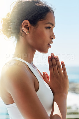 Buy stock photo Shot of a young woman practising yoga