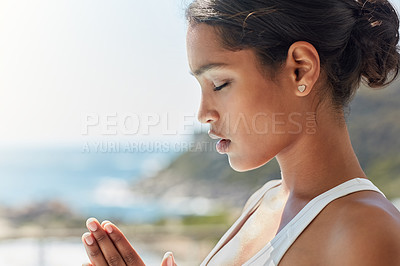 Buy stock photo Shot of a young woman practising yoga