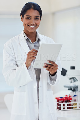 Buy stock photo Portrait of a young female scientist working in a lab