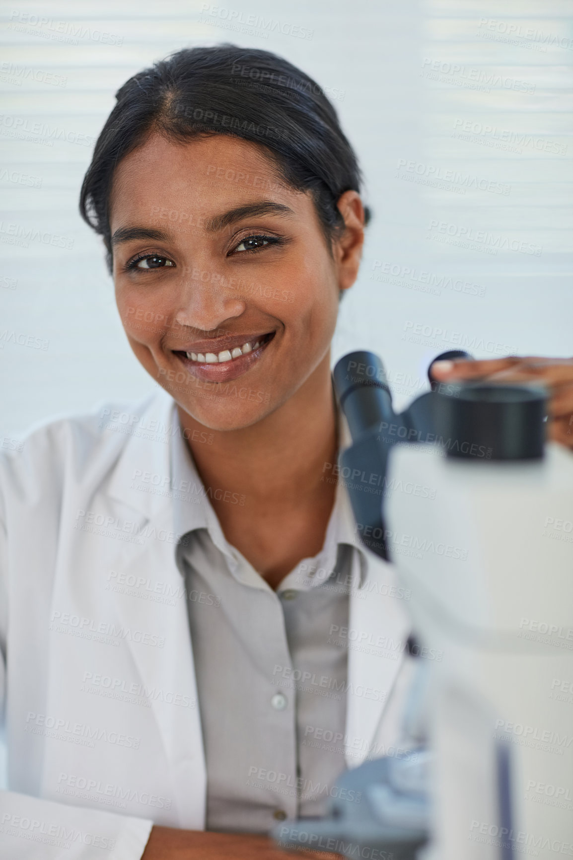 Buy stock photo Woman, scientist and happy in portrait with microscope at lab for career or job opportunity and growth. Female employee, smile and confident on science development, research and knowledge for project