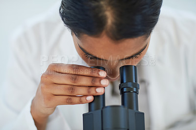 Buy stock photo Science, medical research and female scientist with a microscope for analyzing microbiology in a lab. Healthcare, biotechnology and woman researcher working on a project in pharmaceutical laboratory.