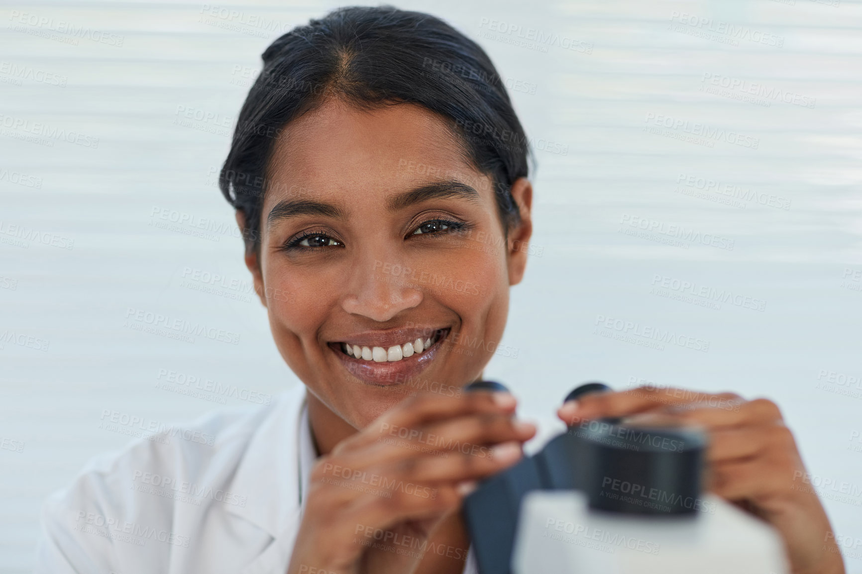 Buy stock photo Portrait of a young female scientist working in a lab