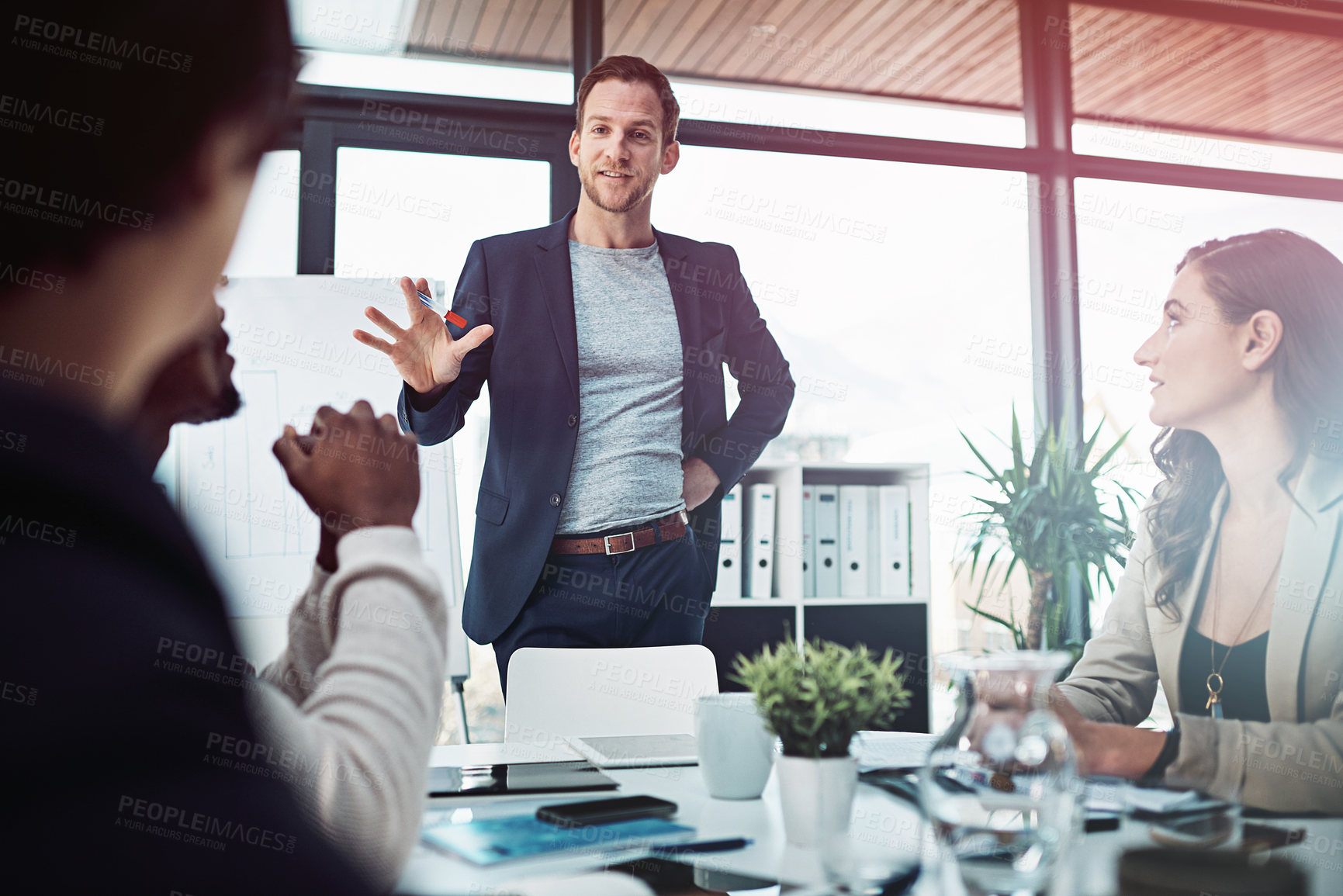 Buy stock photo Shot of businesspeople having a meeting in the boardroom