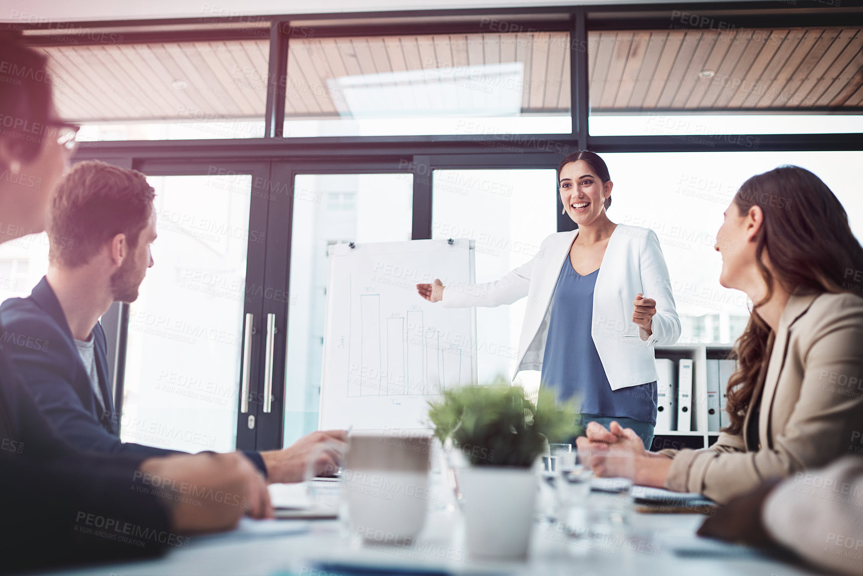 Buy stock photo Professional woman, white board and talking with team for presentation and career project ideas in meeting. Female analyst or speaker for training and happy with bar graph in research data statistics