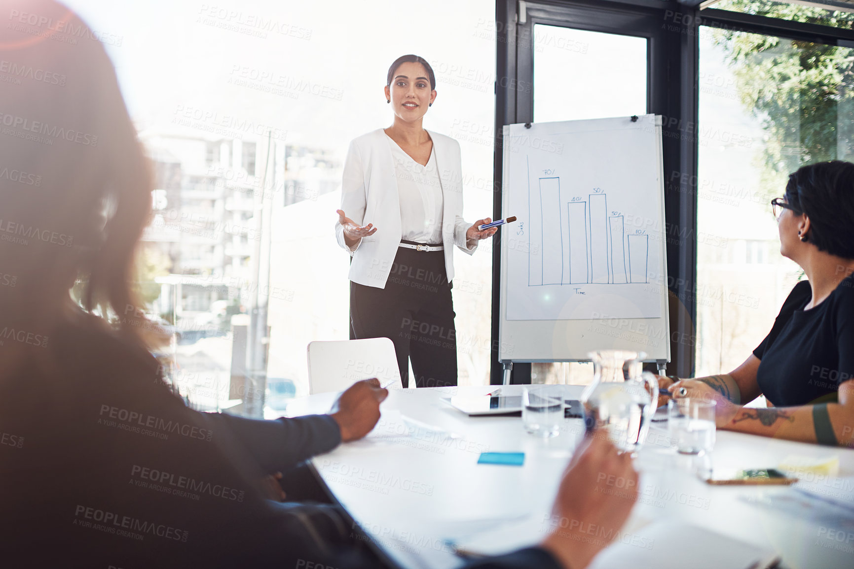 Buy stock photo Shot of businesspeople having a meeting in the boardroom