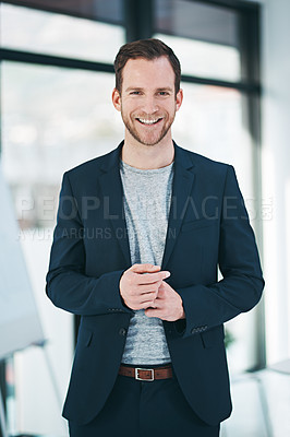 Buy stock photo Portrait of a successful businessman standing in his office