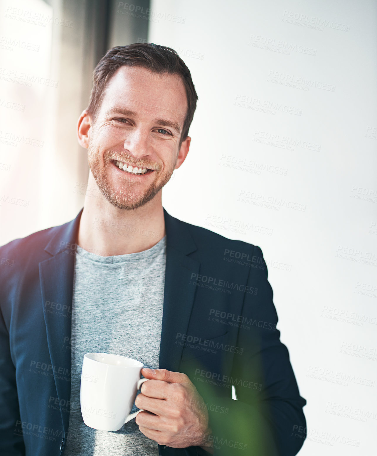 Buy stock photo Business, portrait and happy man with coffee in office for morning, routine or consulting, guide and service with lens flare. Face, pride and broker ready with loan, insurance or property advice