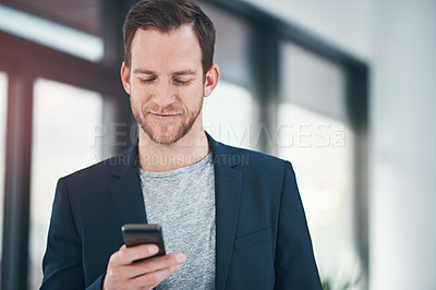Buy stock photo Happy, businessman and reading news with phone in research, review or online interaction at office. Man or employee with smile on mobile smartphone for chatting, texting or communication at workplace