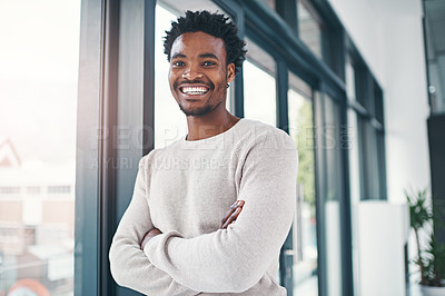 Buy stock photo Black man, portrait and business with confidence by window in career ambition or job opportunity at office. Creative African, male person or designer with smile or arms crossed for pride in startup