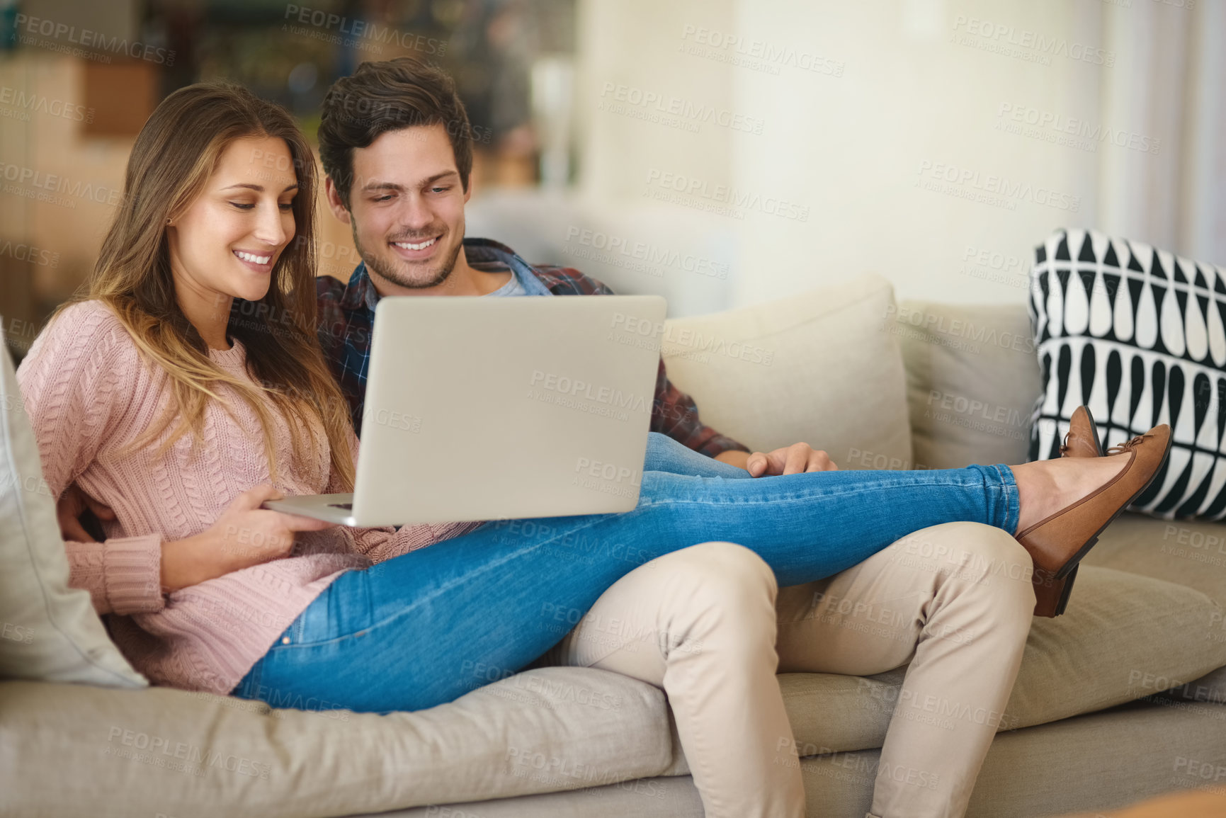 Buy stock photo Love, laptop and couple on sofa for relaxing on weekend with tech for online streaming in house. Happy, people and relationship with movie in living room on couch for romance with subscription.