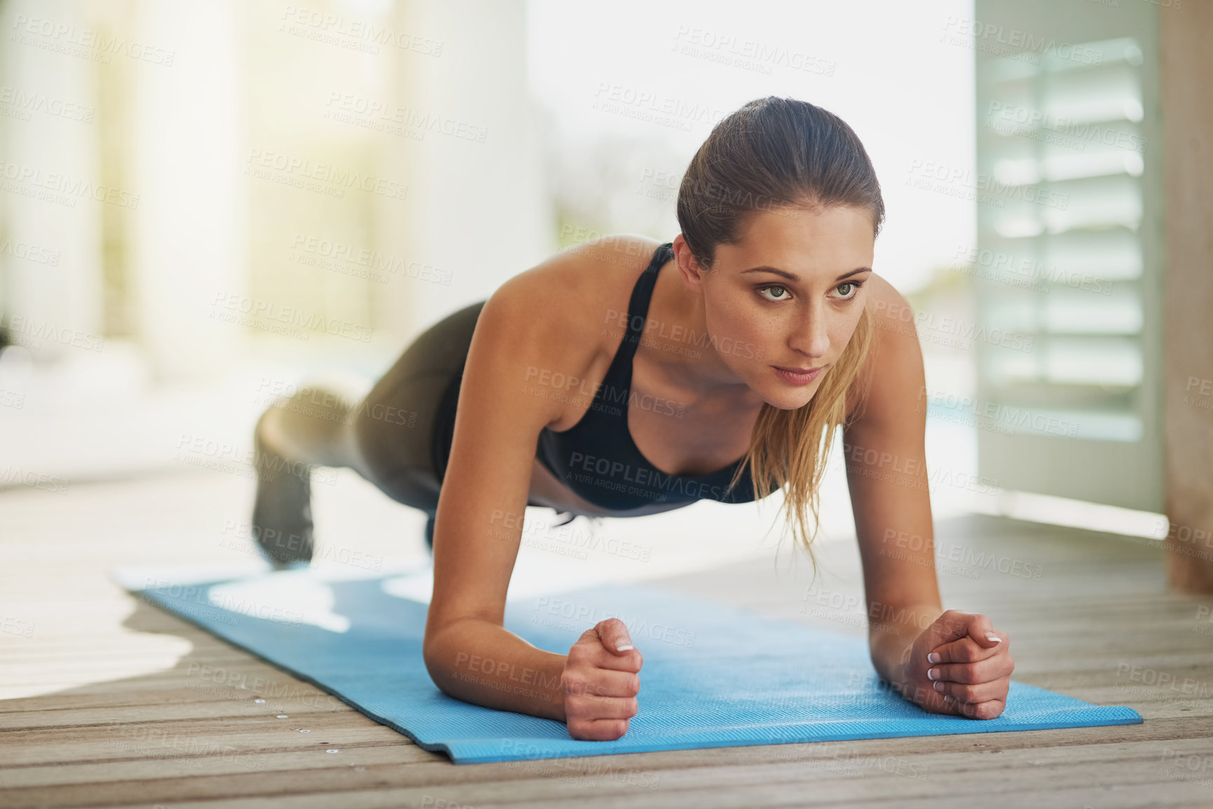 Buy stock photo Active, woman and plank workout at house patio for fitness, exercise and pushup cardio for body wellness. Balance, female athlete and training for strong abs, care and muscle power for health goal
