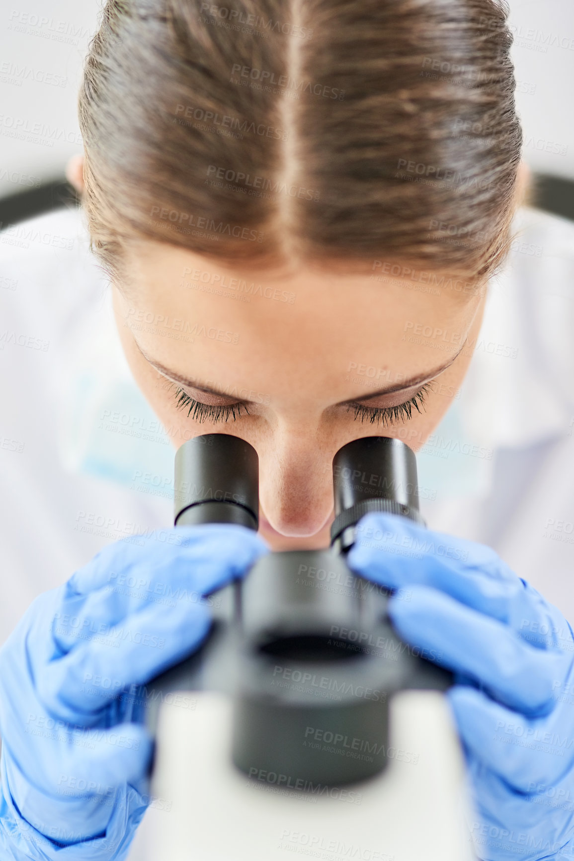 Buy stock photo Scientist, microscope and innovation in laboratory for experiment, medicine and test in clinic. Investigation, woman and medical in hospital for healthcare, research and pharmaceutical career 