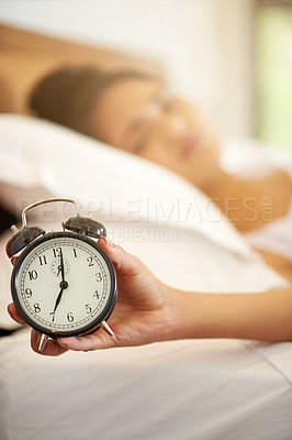 Buy stock photo Woman, hand and alarm with zoom, sleeping and tired or lazy in morning with snooze and person in house. Bedroom, watch and wake up time after sleep, rest and relax with burnout, apartment or home