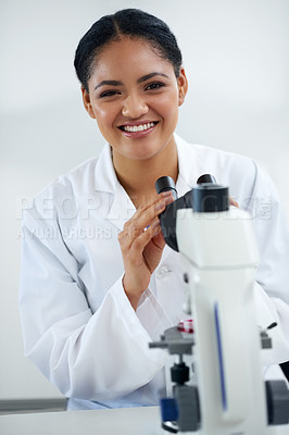 Buy stock photo Cropped portrait of an attractive young female scientist working in her lab