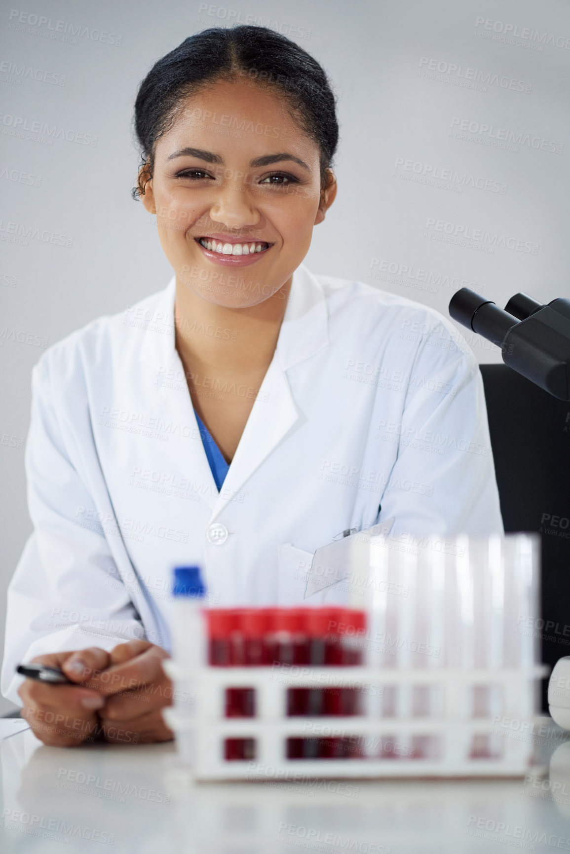 Buy stock photo Cropped portrait of an attractive young female scientist working in her lab