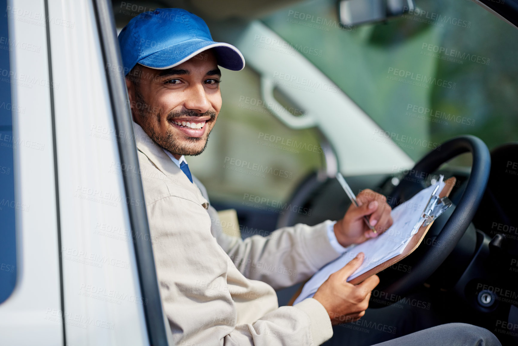 Buy stock photo Portrait of a happy delivery man driving his van
