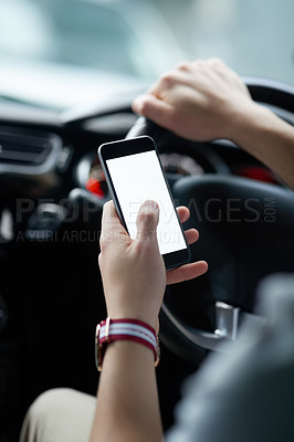 Buy stock photo Closeup shot of an unrecognisable man using his cellphone while driving