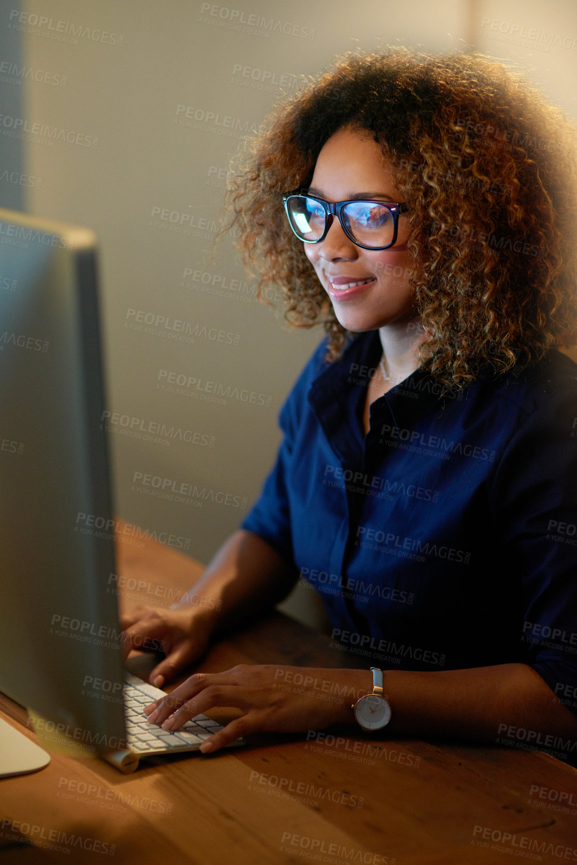 Buy stock photo Night, business computer and African woman at desk with smile for project deadline, review or report. Late, professional and happy person for overtime, schedule update or admin clerk in office