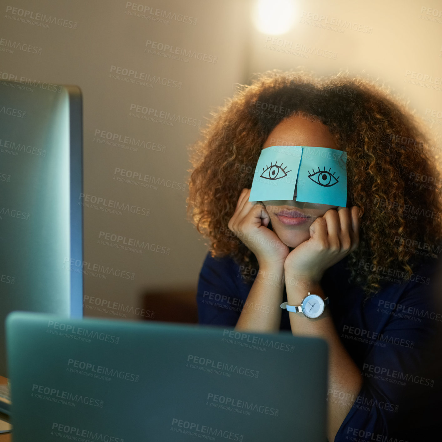 Buy stock photo Cropped shot of a young businesswoman working late in an office with adhesive notes covering her eyes