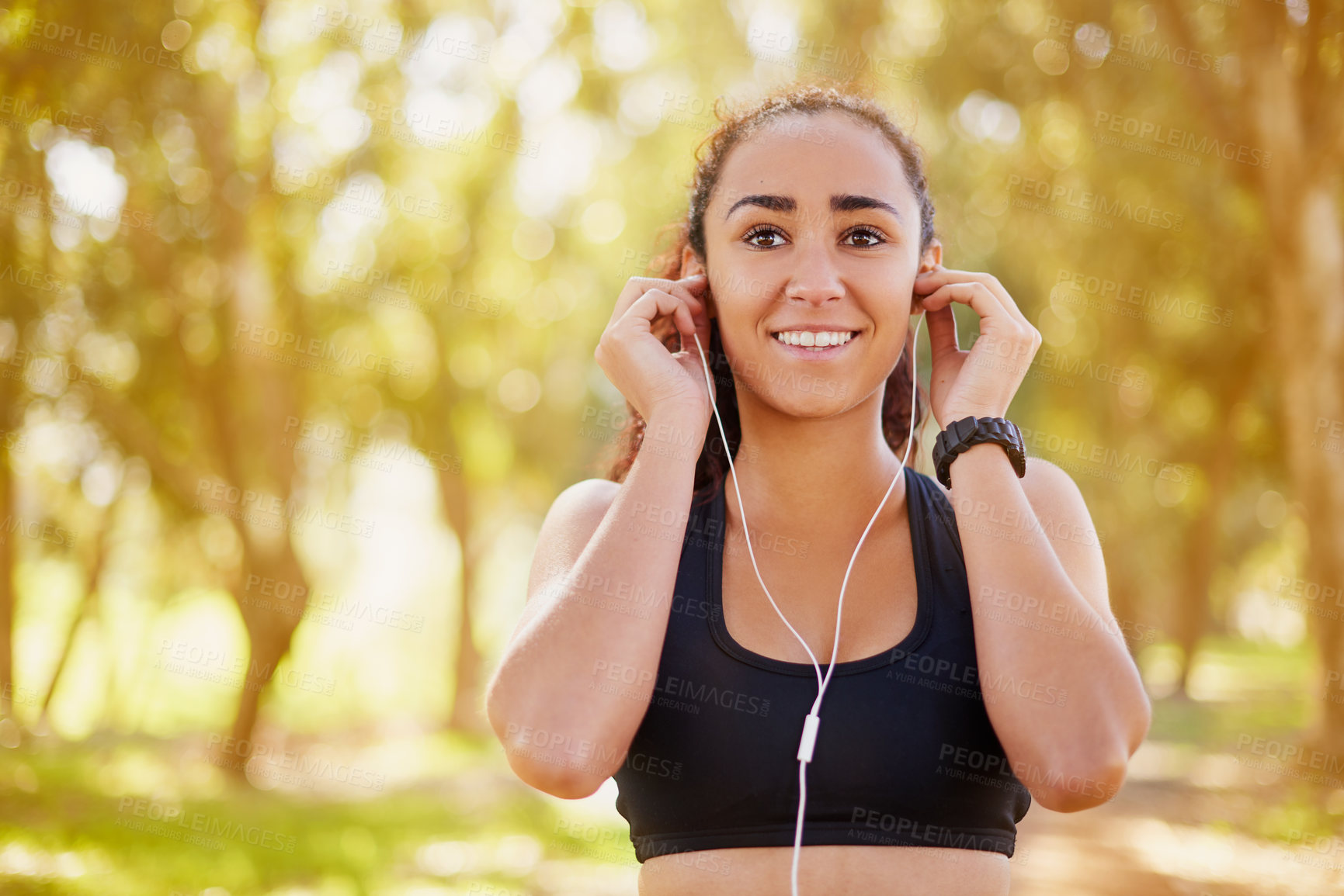 Buy stock photo Black woman, park and earphones with music for exercise, sport training and podcast for running. Thinking, workout and African girl outdoor with listening to radio and ideas for playlist in Colombia