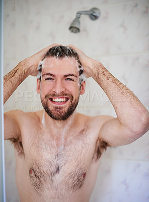 Buy stock photo Cropped shot of a handsome young man having a shower at home