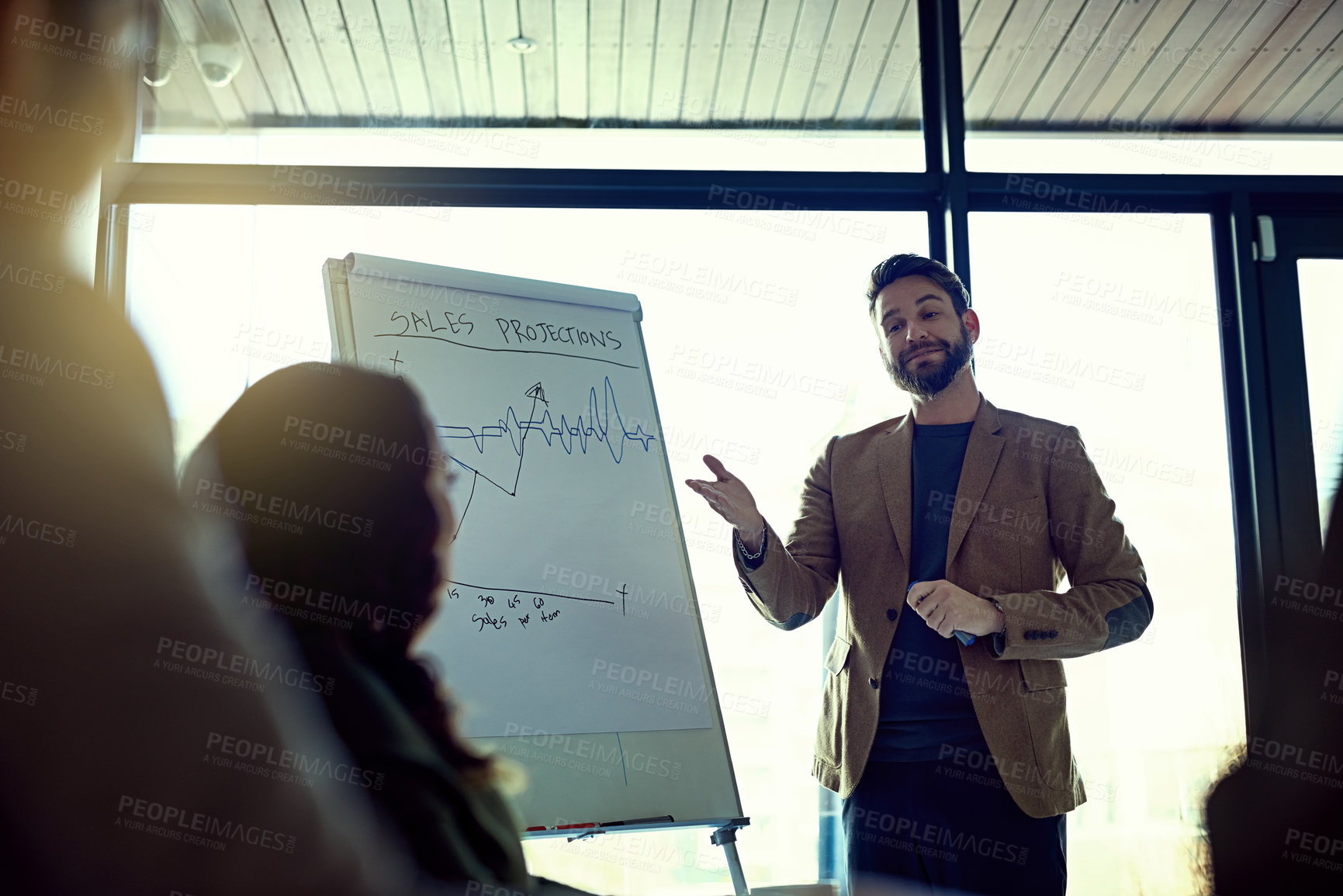 Buy stock photo Business man, sales presentation and training with meeting chart, mentor and conversation in an office. Planning, speaker and discussion with company presenter and whiteboard with team leader