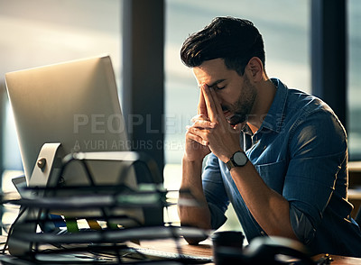 Buy stock photo Stress, headache and tired with a business man in his office, sitting eyes closed at his desk for a deadline. Night, burnout and exhausted with a young male employee struggling with pain at work