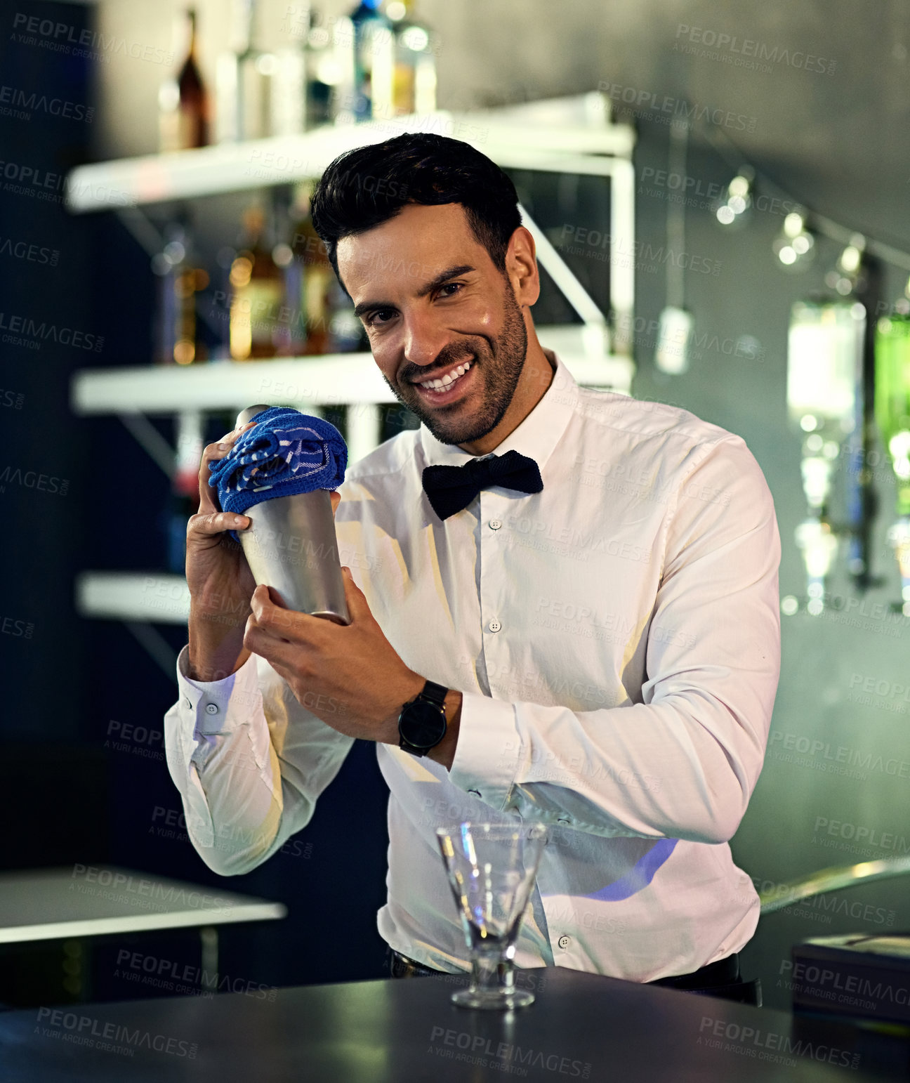 Buy stock photo Pub, portrait and barman with cocktail shaker for alcohol drink, mixing or hospitality in nightclub. Glass, bartender or male person with confidence for prepare, service or nightlife with liquor