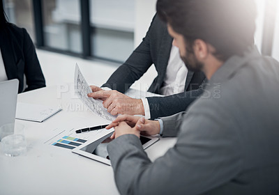 Buy stock photo High angle shot of a group of businesspeople meeting in the boardroom