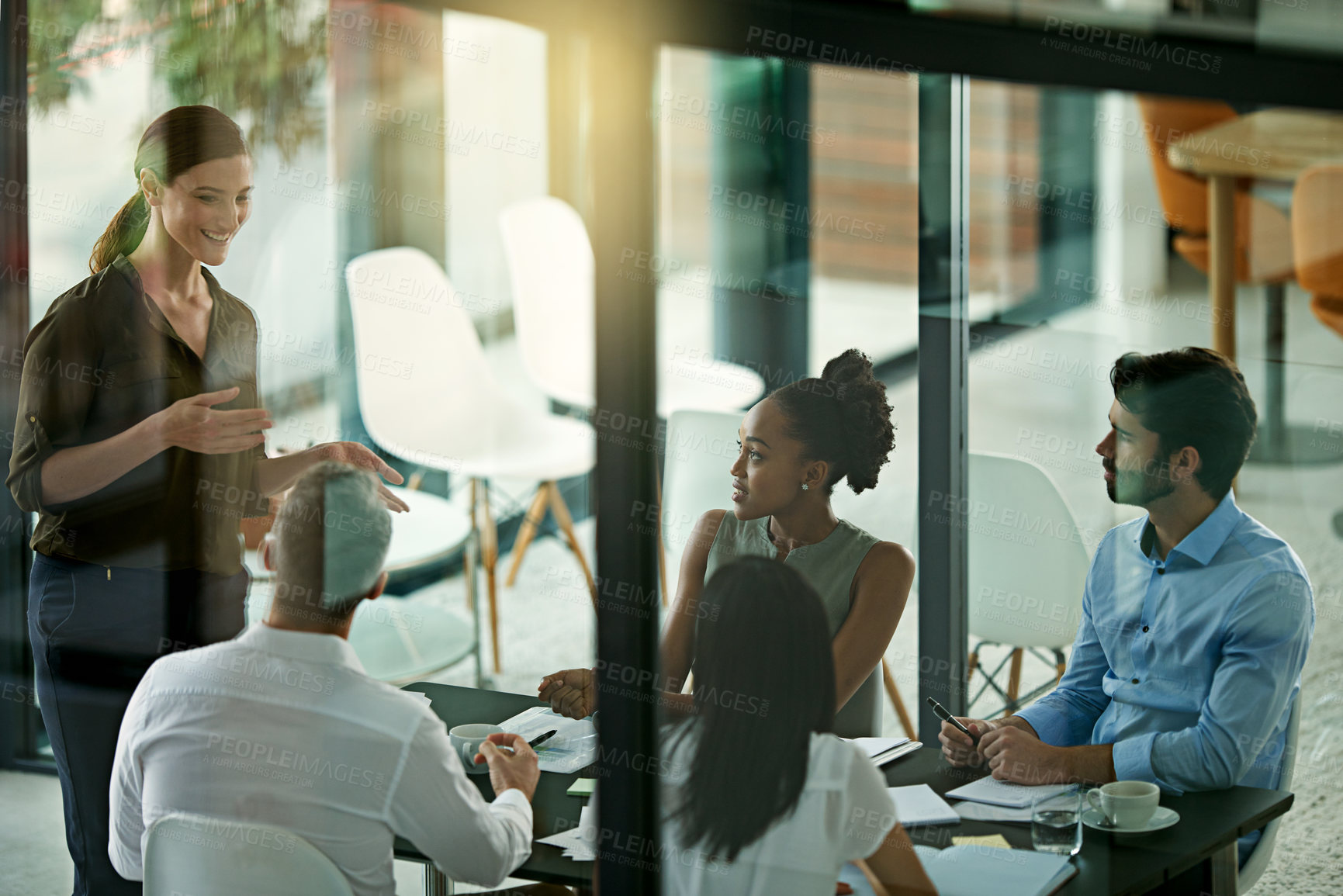 Buy stock photo Woman, presentation and business meeting in office with collaboration for opinion, project proposal and teaching. Female coach, talking and workshop for improvement with staff training and education