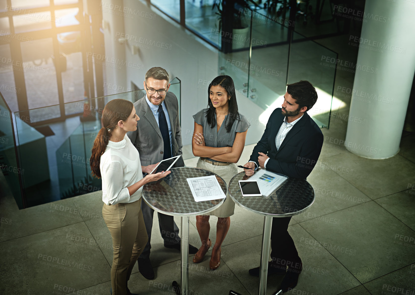 Buy stock photo Boardroom, listening and tablet for employees with executive, conversation and planning of ideas for investor. Corporate, men and woman in office, people and smile for brainstorming and discussion