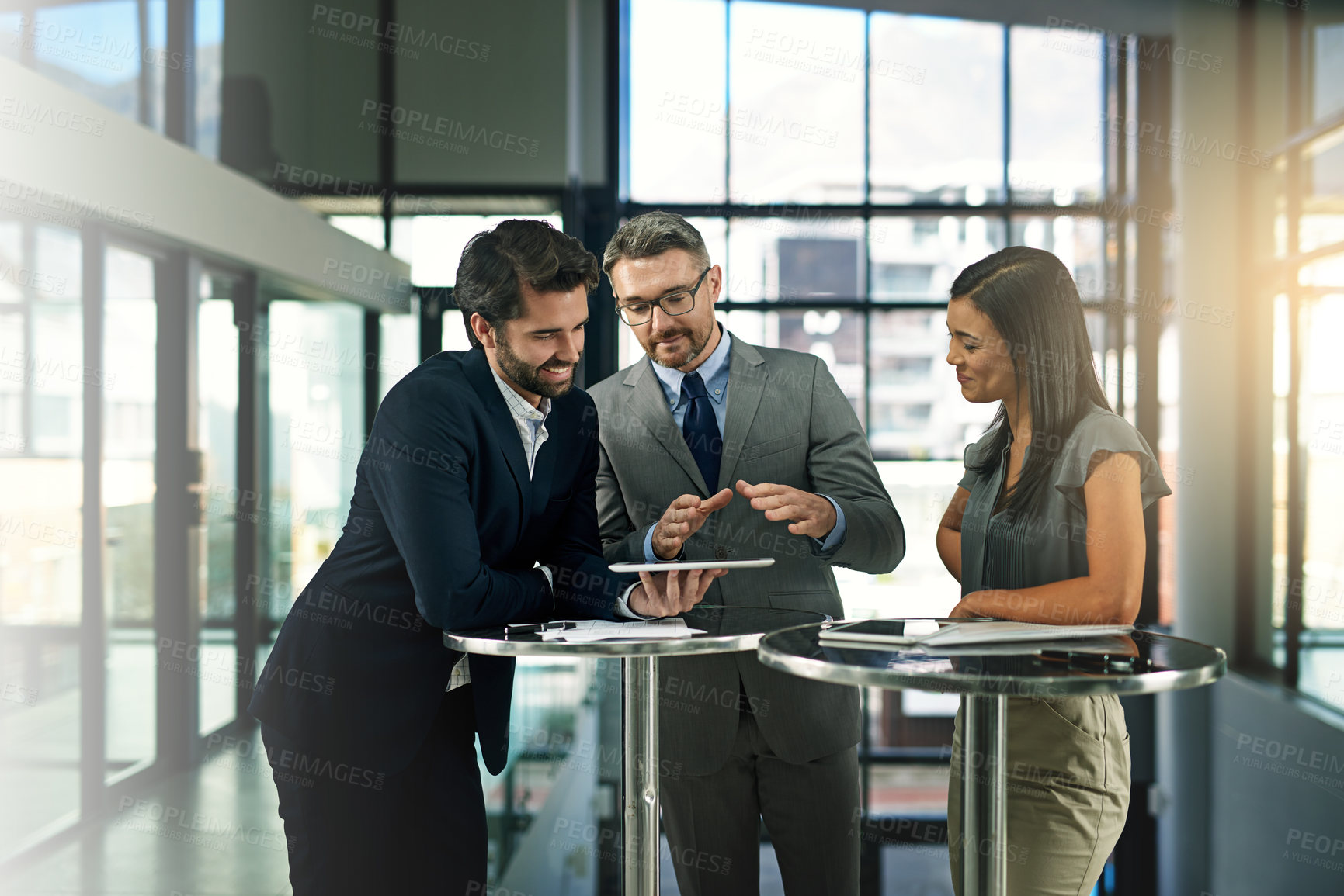 Buy stock photo Boardroom, planning and tablet for employees with executive, conversation and listening to ideas for investor. Corporate, men and woman in office, people and smile for brainstorming and discussion