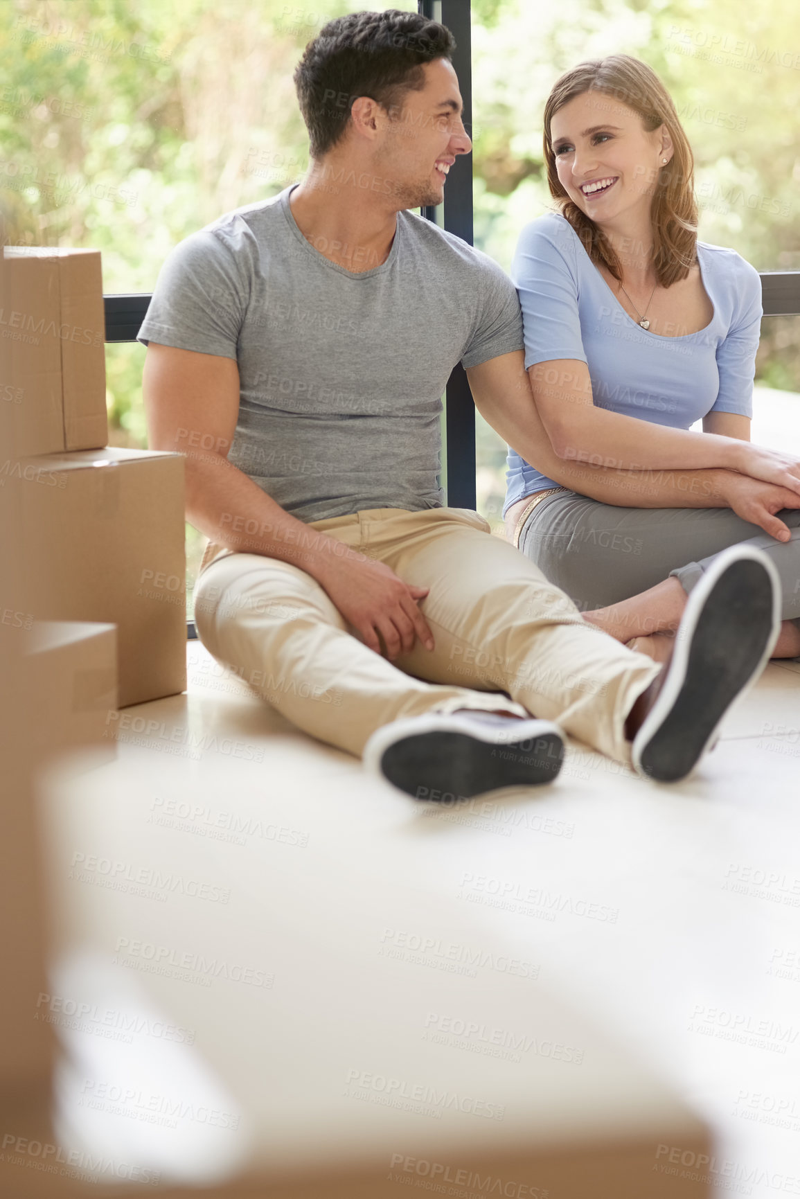 Buy stock photo Couple, boxes and moving to new home, mortgage and property success or investment home loan. People, cardboard and rent or buy apartment for achievement, relocation and purchase for real estate dream