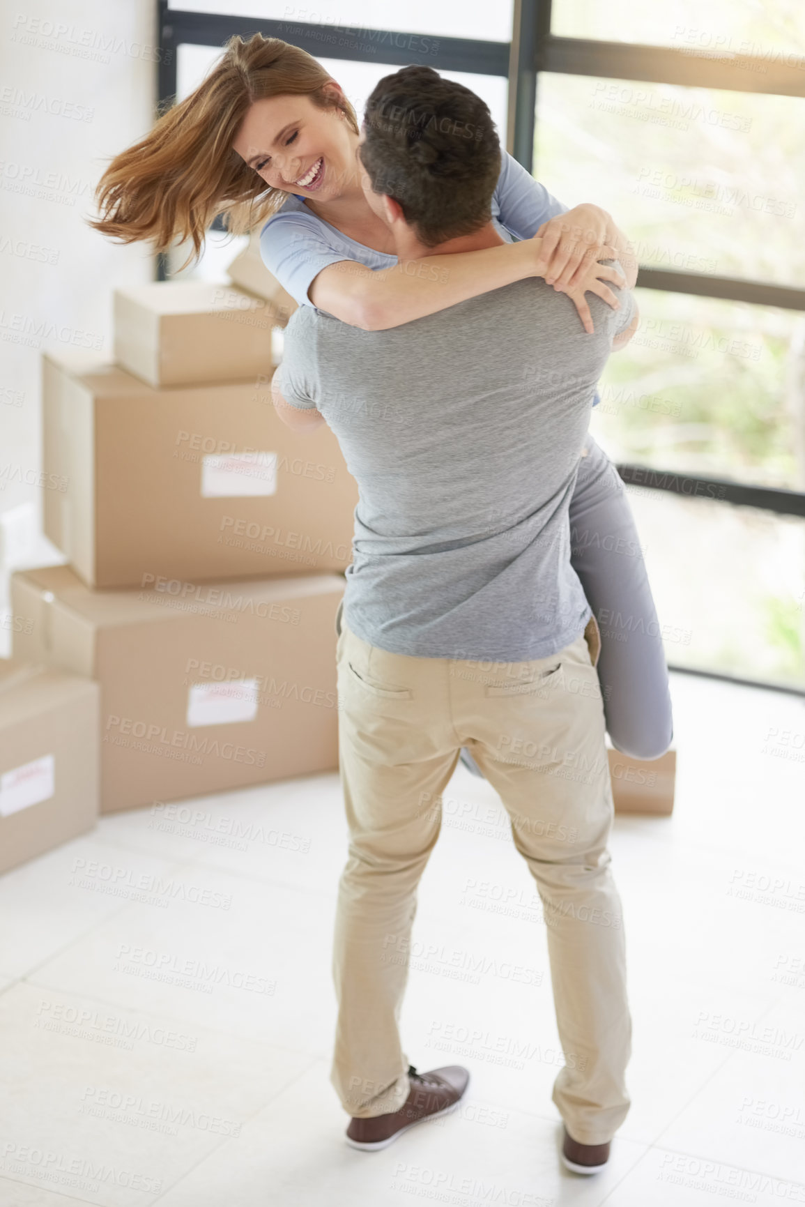 Buy stock photo Couple, boxes and hug in new home, mortgage and property success or investment home loan. People, cardboard and rent or buy apartment for celebration, together and purchase for real estate dream
