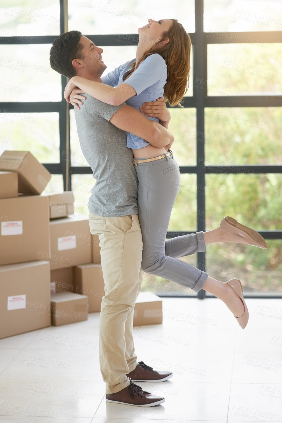 Buy stock photo Couple, boxes and buy a new home, hug and property success or investment home loan. People, cardboard and embrace to rent apartment for achievement, relocation and purchase for real estate dream