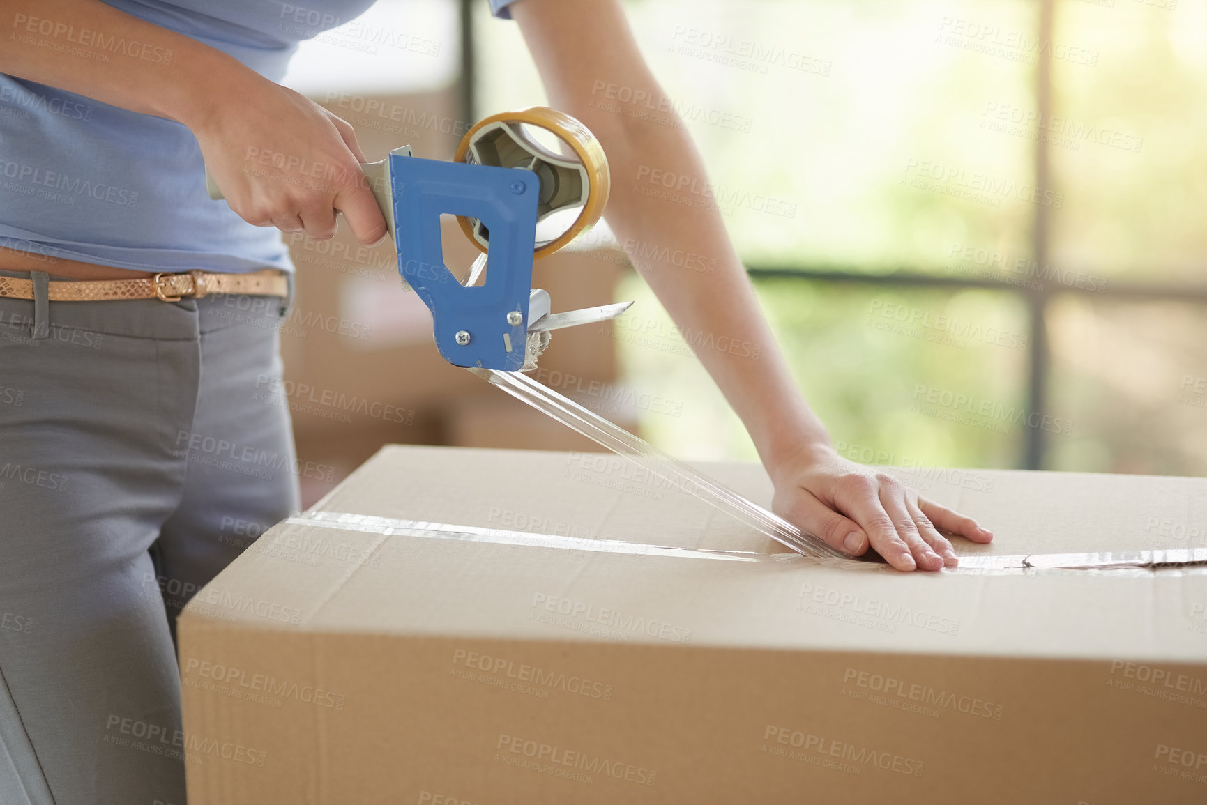 Buy stock photo Hands, tape and packaging box for moving, mortgage and property investment in new home. Real estate, cardboard and person seal with tools for cargo storage, packing or relocation to apartment house