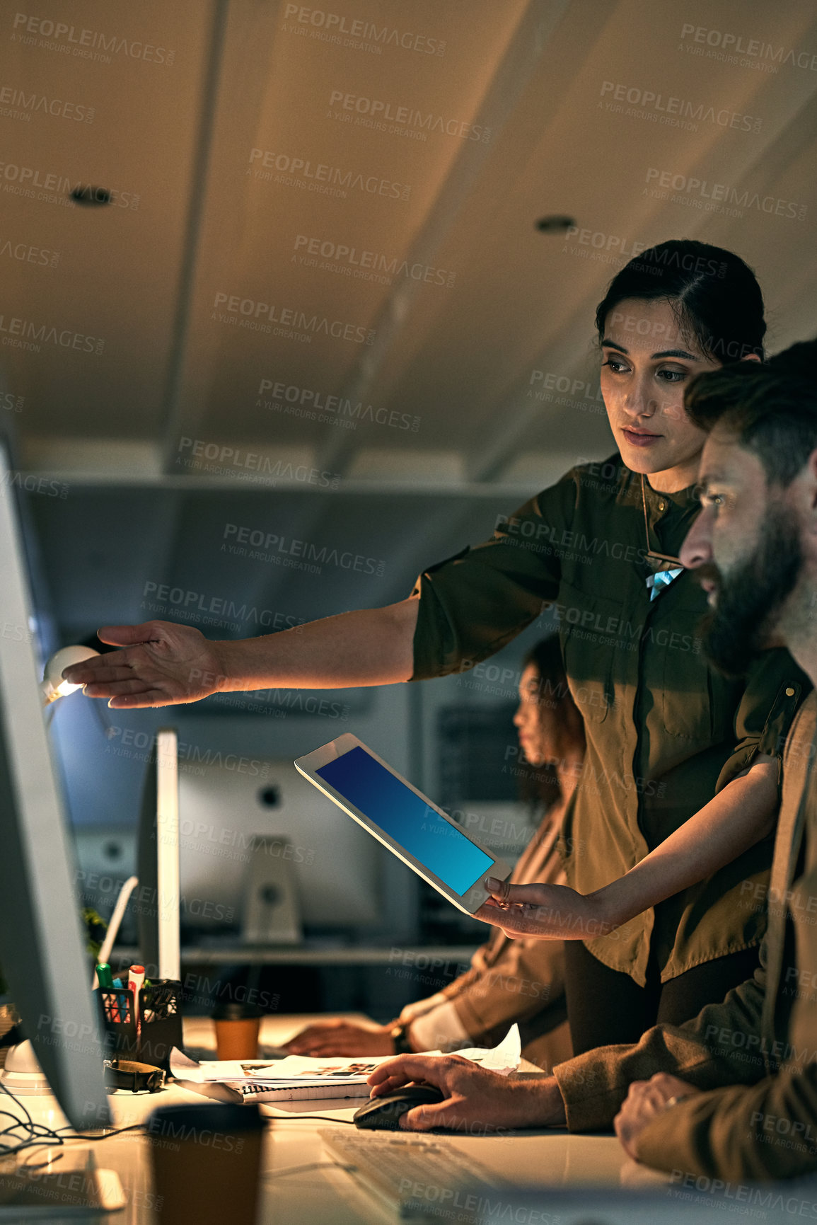 Buy stock photo Cropped shot of colleagues working late