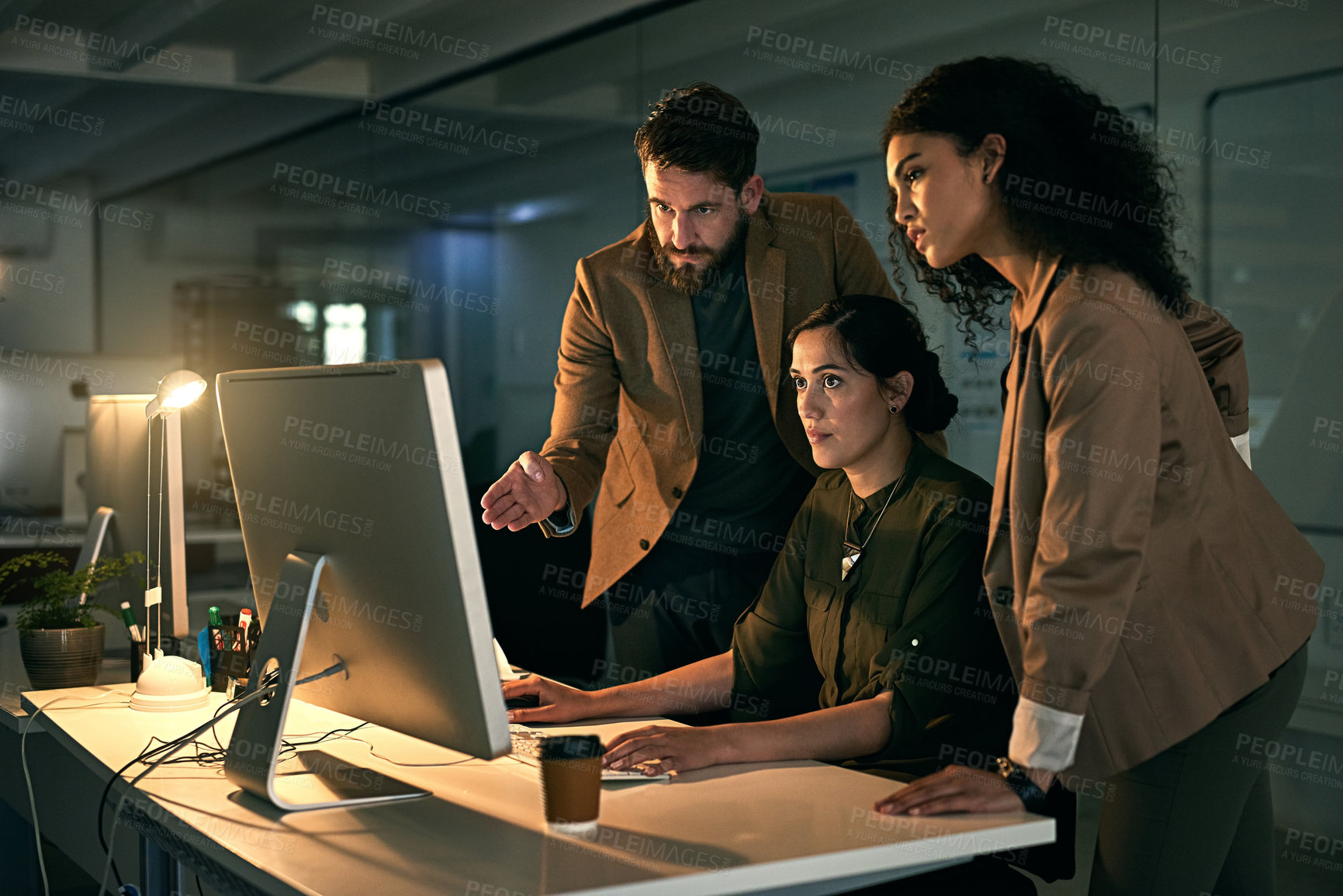 Buy stock photo Cropped shot of colleagues working late