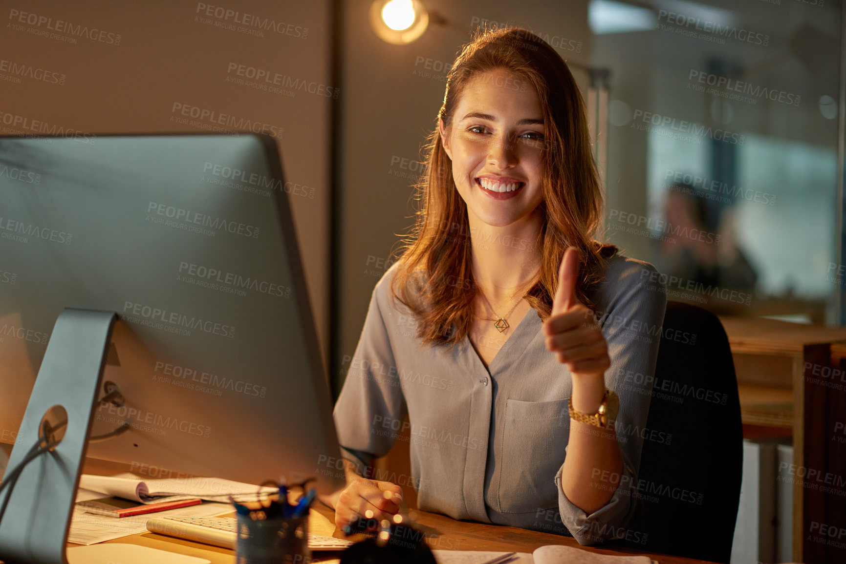 Buy stock photo Woman, worker and thumbs up in office with computer on work break for overtime or deadline at night. Female person, portrait and approval with happiness as administrator for administration and agree