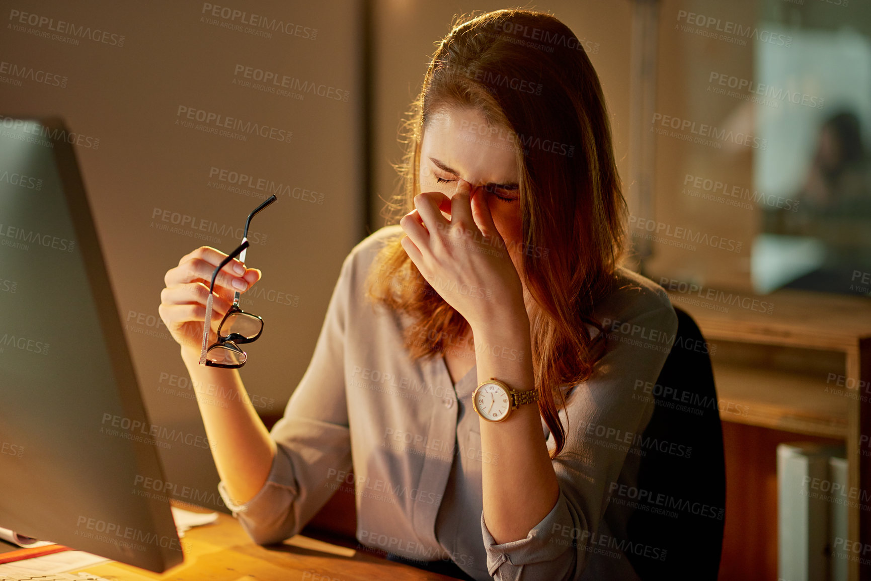 Buy stock photo Woman, employee and tired in office with computer at work  with overtime or deadline at night. Female person, exhausted and worker with pc as administrator for administration and stress in desk