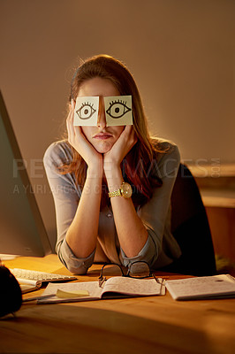 Buy stock photo Portrait of an attractive young businesswoman sitting with sticky notes over her eyes in the office