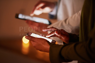 Buy stock photo Shot of an unrecognizable businesspeople using tablets in the office