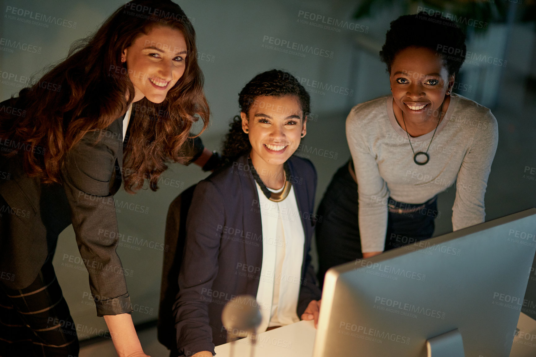 Buy stock photo Portrait of a group of colleagues working late in an office