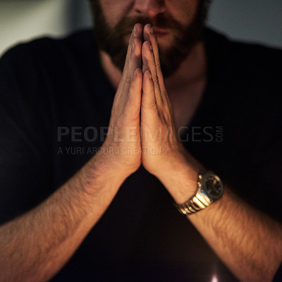Buy stock photo Closeup shot of a man with his hands clasped in prayer