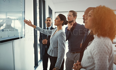 Buy stock photo Data review, colleagues in a business meeting and planning in a boardroom of their workplace. Analytics or statistics, collaboration or teamwork and people in a office for strategy or presentation
