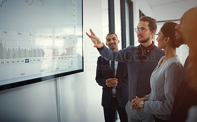 Buy stock photo Business people, group and man with a presentation, screen with charts, financial review or profit growth. Finance, team or presenter with feedback, investment or teamwork with collaboration or deals