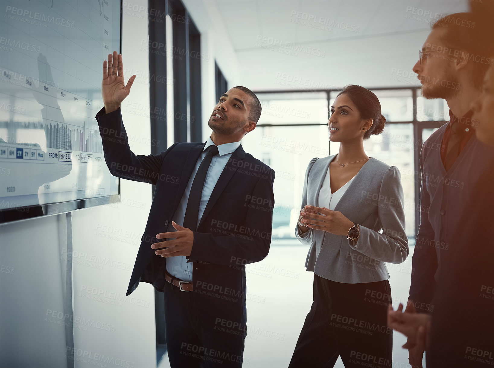 Buy stock photo Shot of a young businessman giving a presentation in the boardroom